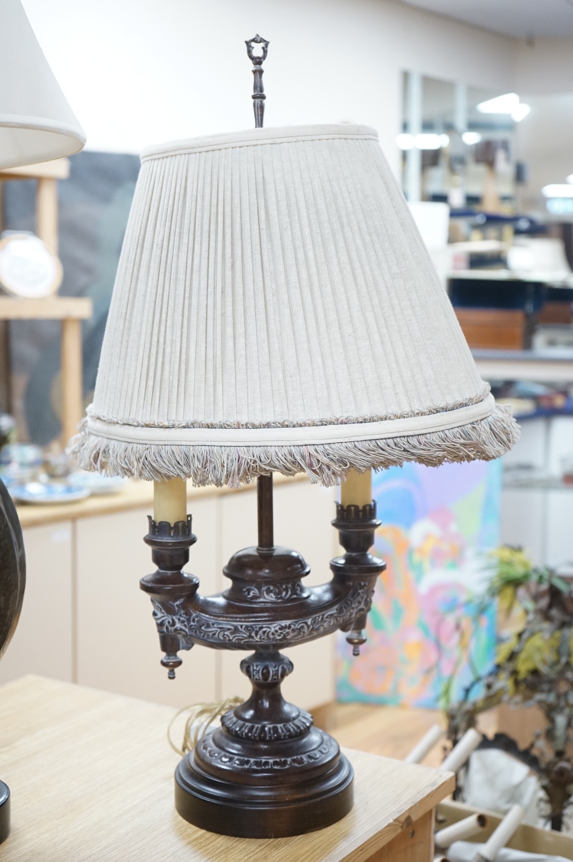 A Frederick Cooper Bouillotte lamp, together with a hammered metal table lamp, formed from a water flask (2)